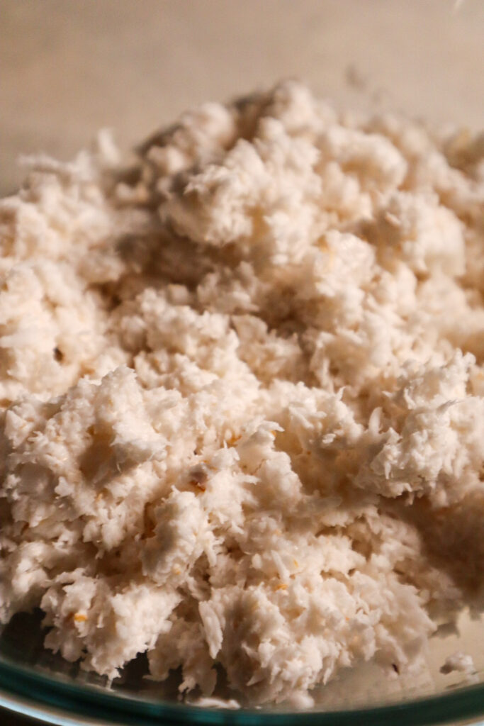 Fresh Grared Coconut Board In A Bowl