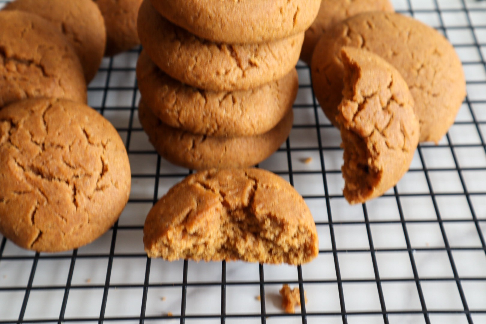 Paleo pumpkin cookies on a cooling rack.