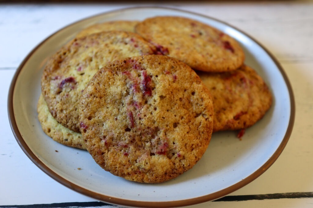 Cranberry jam sugar cookies on a plate.