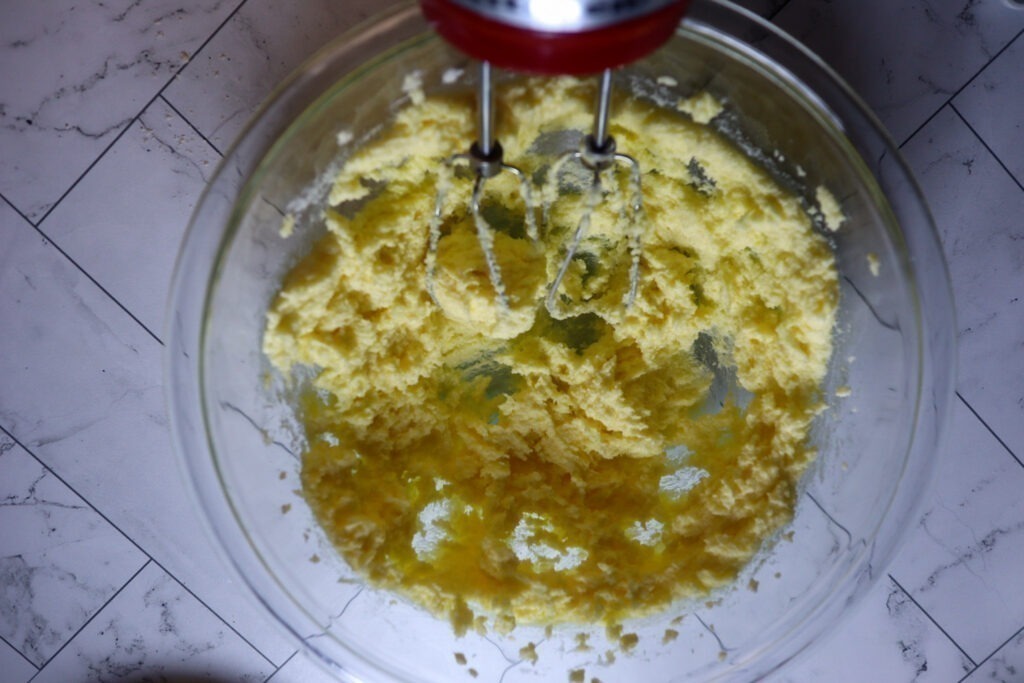 Mixing the butter and sugar-free sweetener.