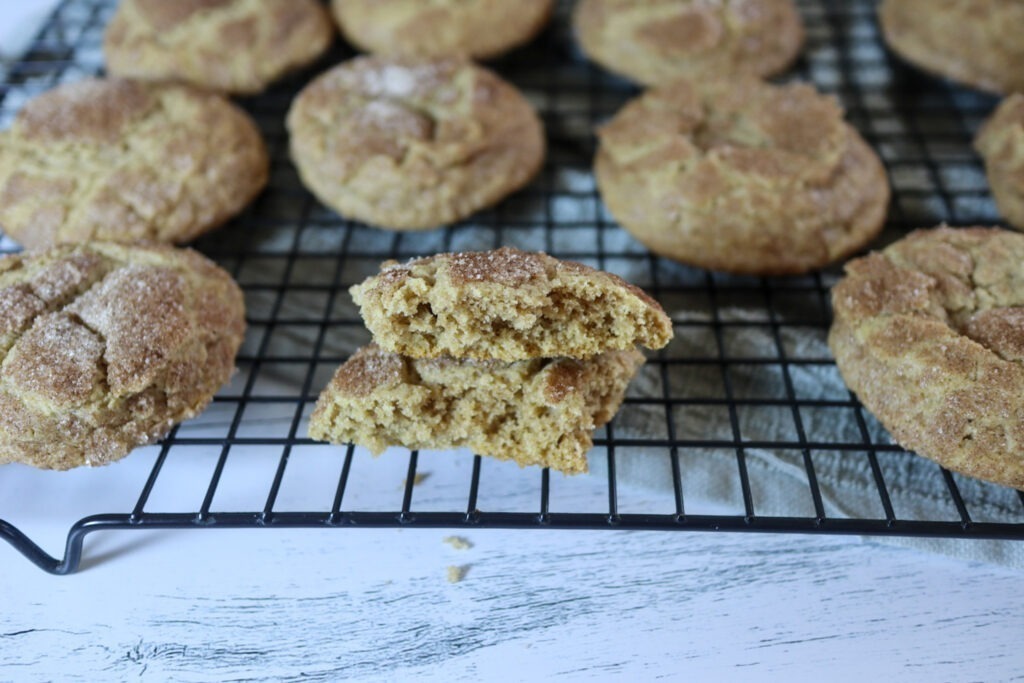 Gluten-free Snickerdoodles on a cooling rack.