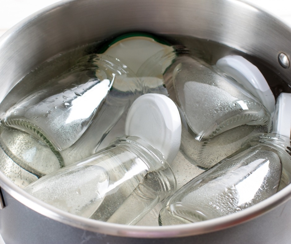 How to sterilize jars in boiling water.