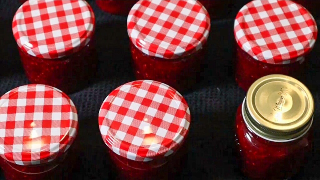 Letting the canned strawberry crannberry jam rest at room temperature overnight.