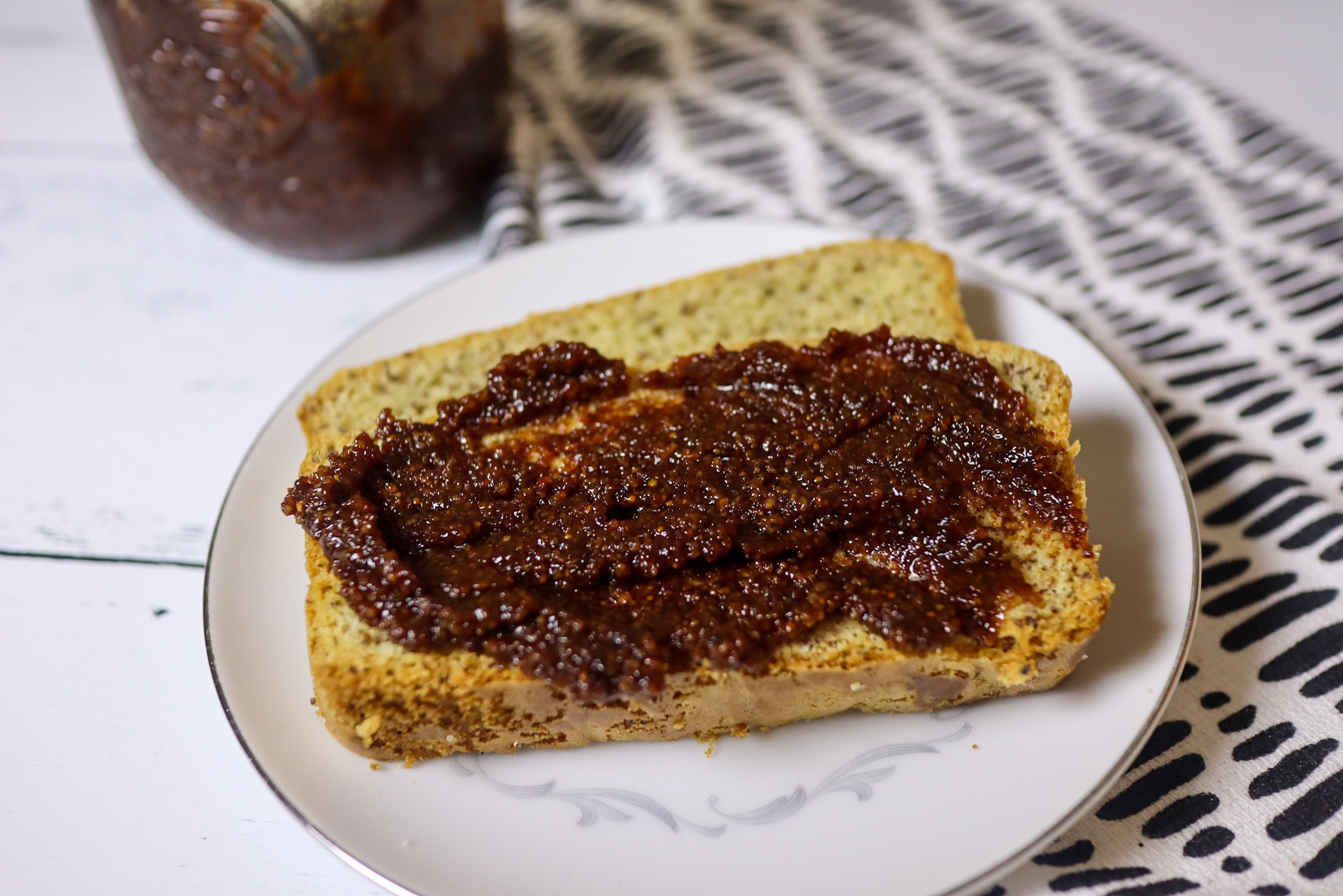 Fig jam made from dried figs spread on almond bread.