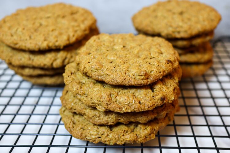Gluten-free oatmeal cookies on a cooling rack.