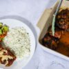 Crispy BBQ chicken with Alabama white BBQ sauce servedwith parsley rice and mixed vegetables.