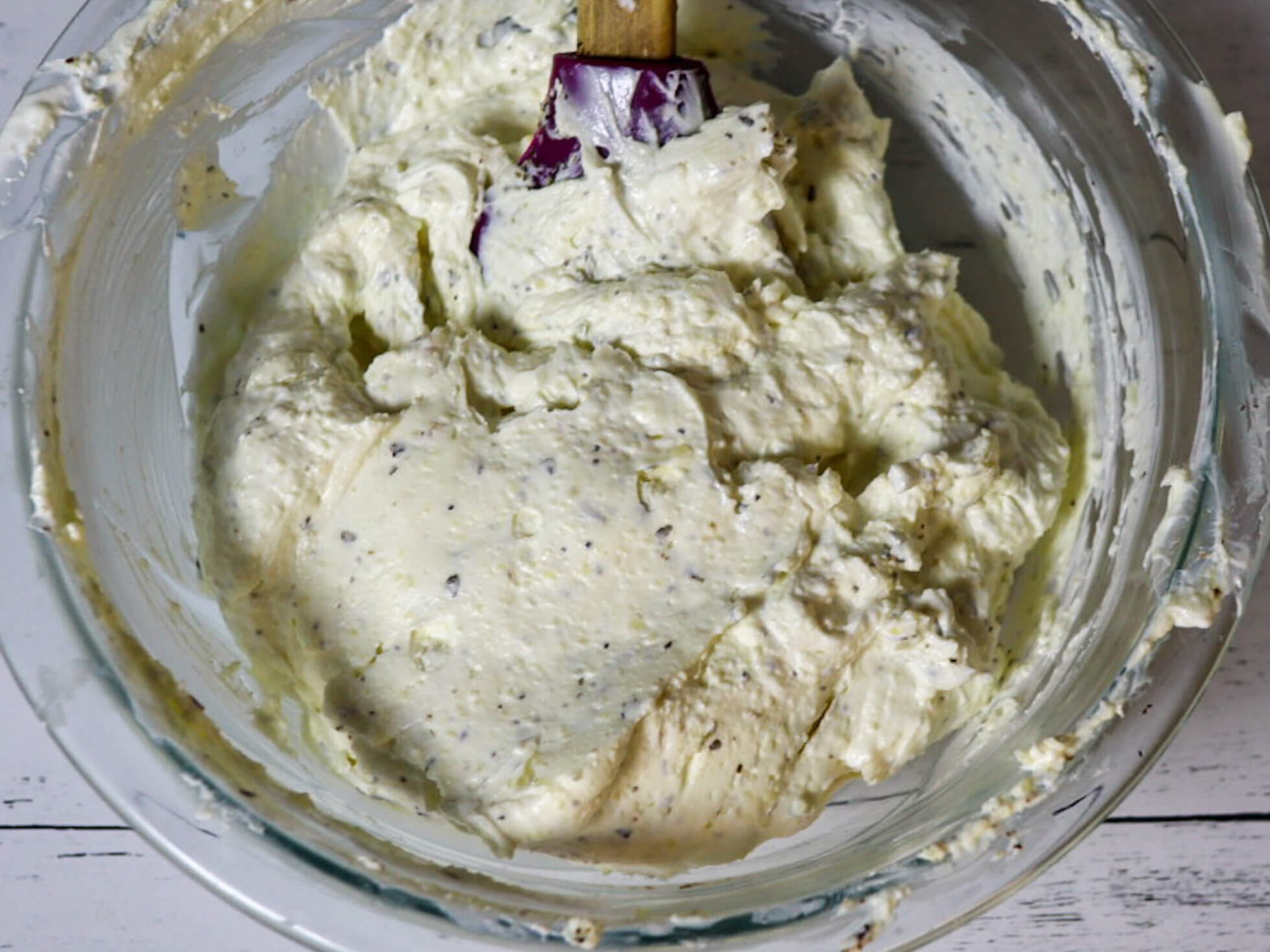 Mixing the cheese layer.