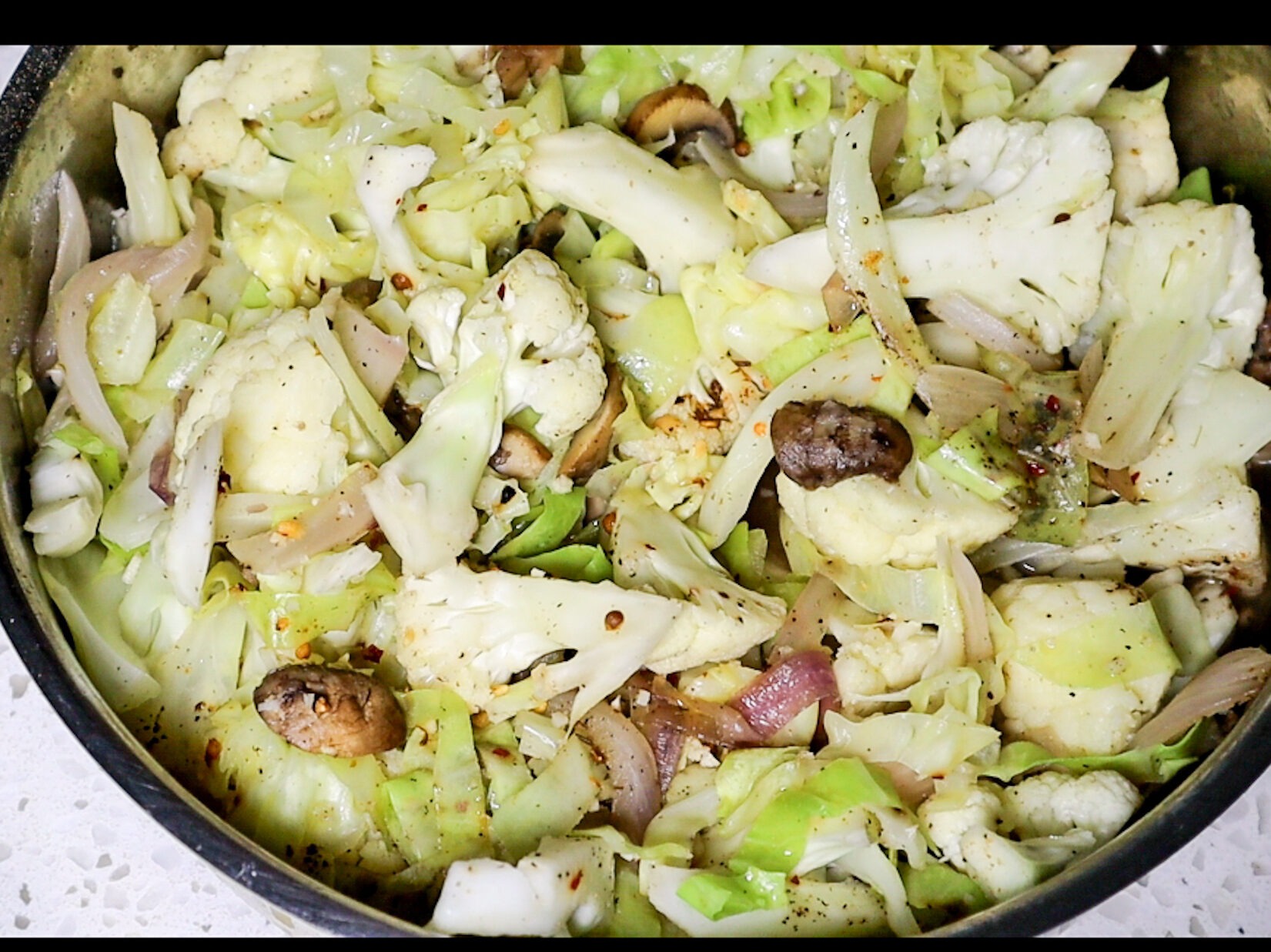 Sauteing the vegetables. 