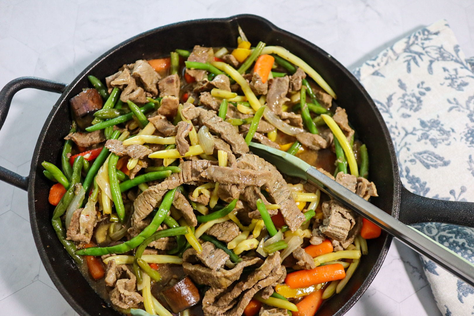 Beef stir-fry in a skillet.